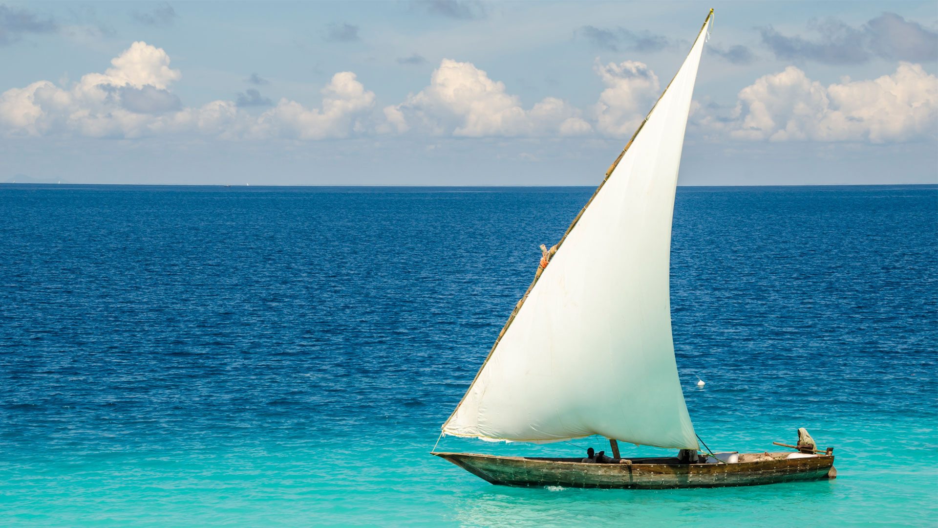 traditional-africal-sailboat-zanzibar-island-paje-beach-blue.jpg